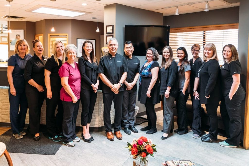 family-dental-centre-team-of-dental-staff-standing-together