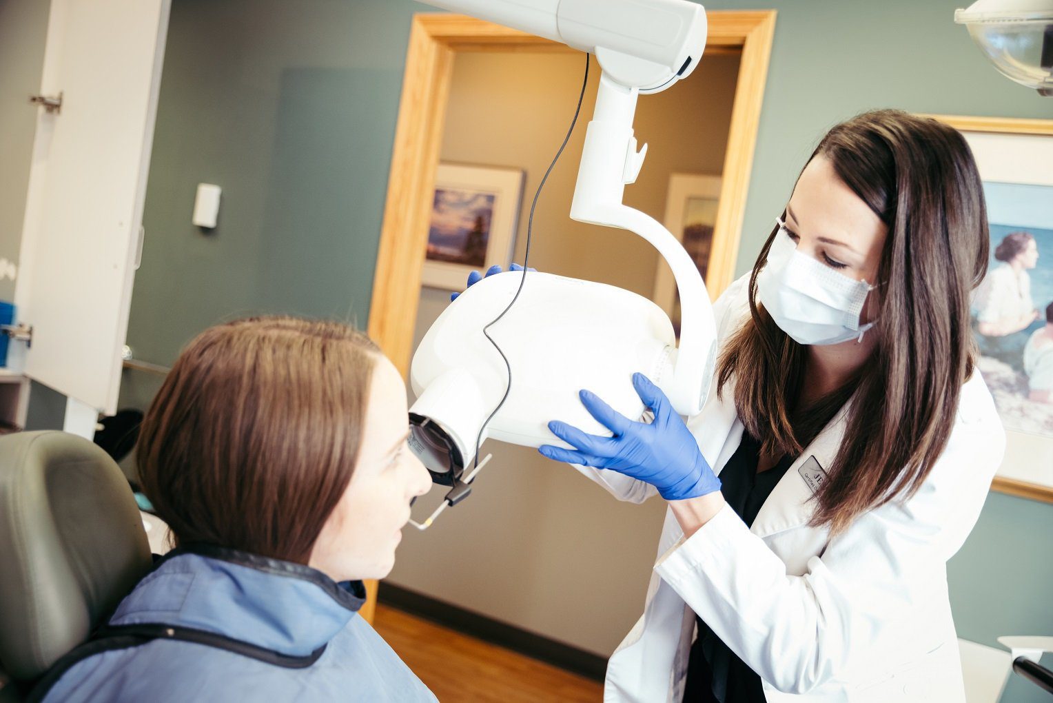 Photo 1 what is the process of getting veneers dental assistant taking x-rays