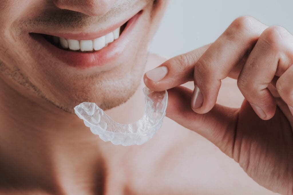 Nighttime mouth guard of young man