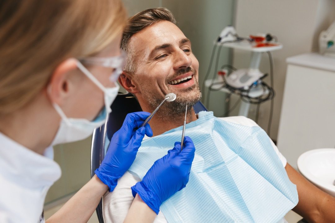Young man sitting in dental office